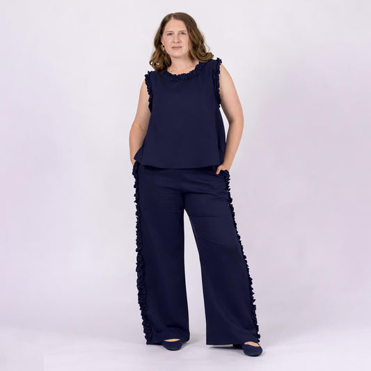 ladies navy linen top with ruffle eding