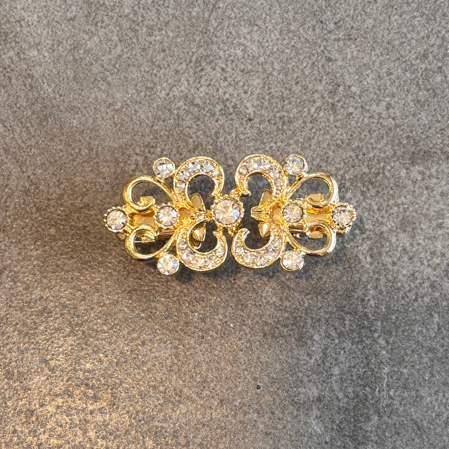 gold clothing cinch styling tool