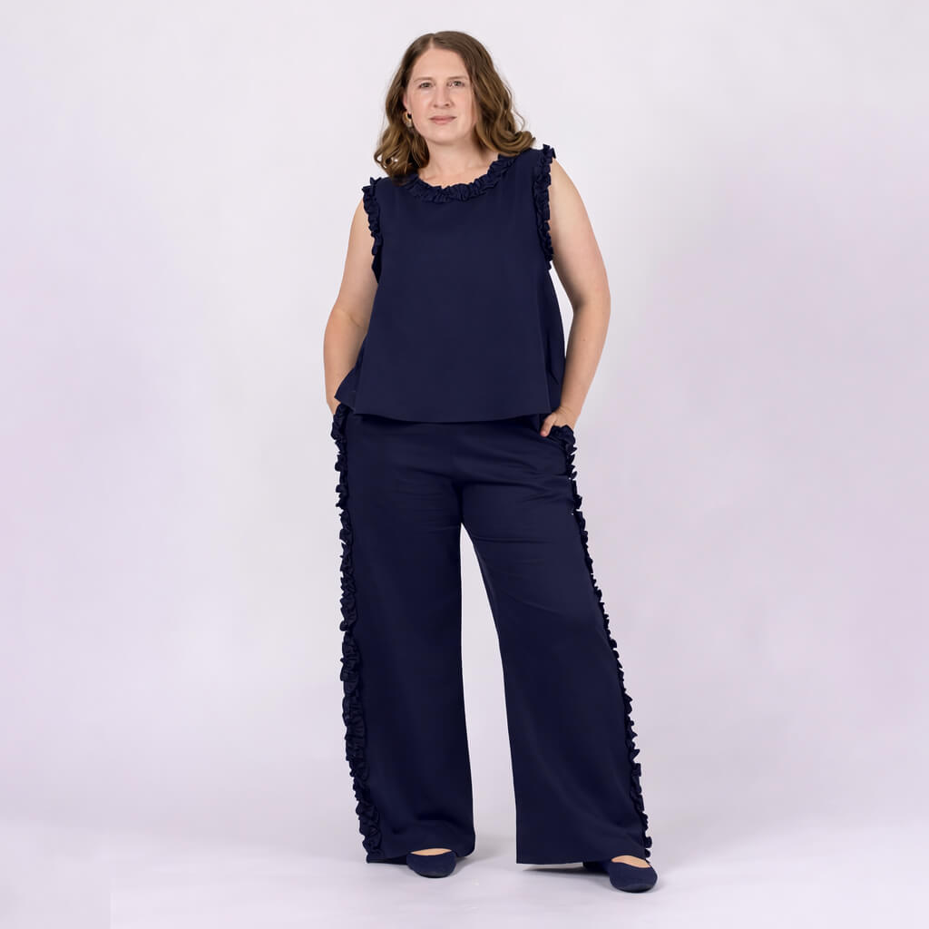 ladies navy linen top with ruffle eding