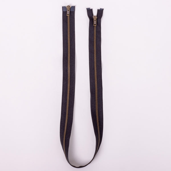 black two way metal zip with copper teeth