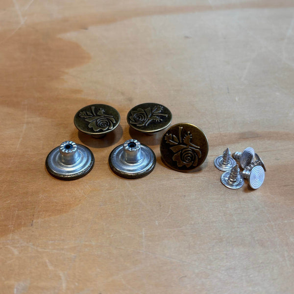 brass coloured rose print jeans buttons