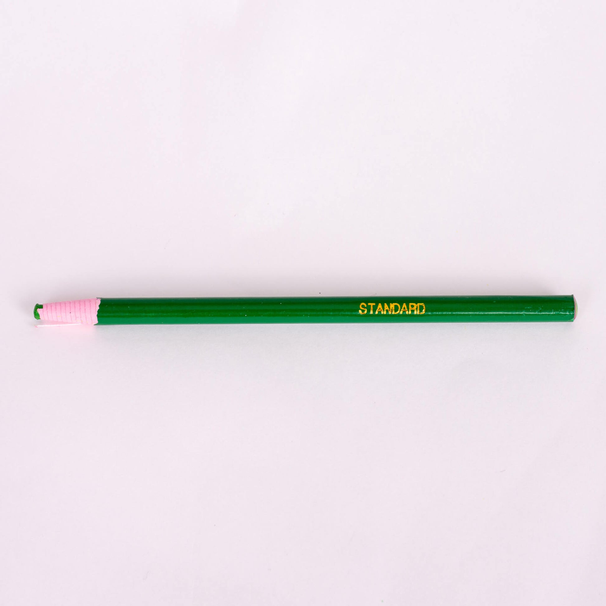 green tailors sewing chalk pencil